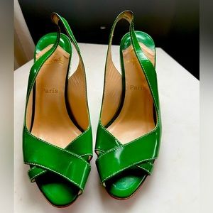 CHRISTIAN LOUBOUTIN
Patent Leather Slingback Sandals